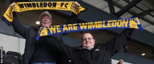AFC Wimbledon fans with scarves