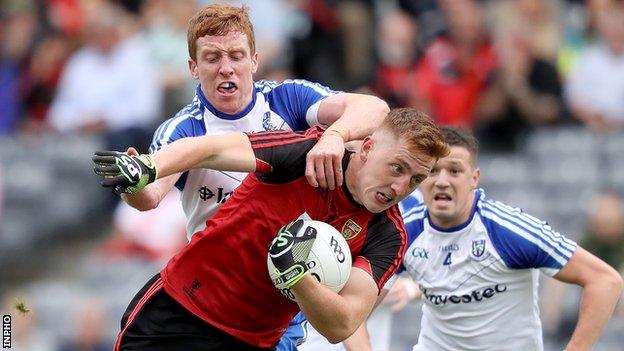 Monaghan's Kieran Duffy challenges Down's Sean Dornan