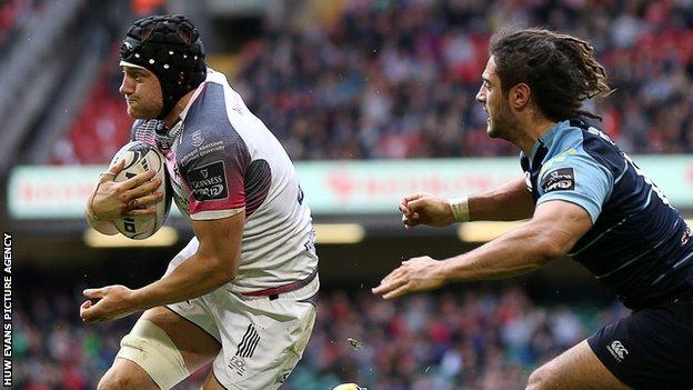 James King in action for Ospreys against Blues' Josh Navidi