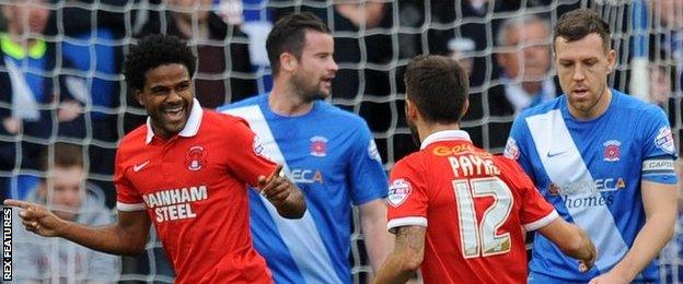 Leyton Orient's Bradley Pritchard celebrates his first-half goal against Hartlepool