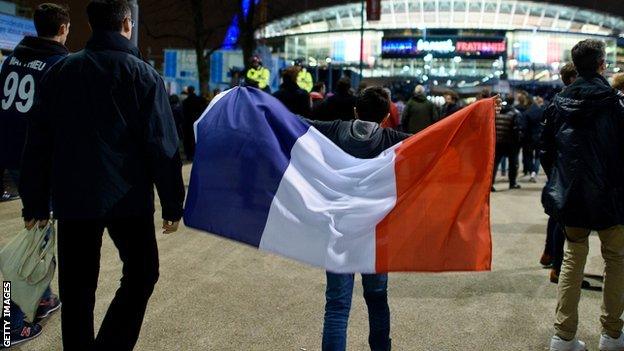 Fan carrying France flag