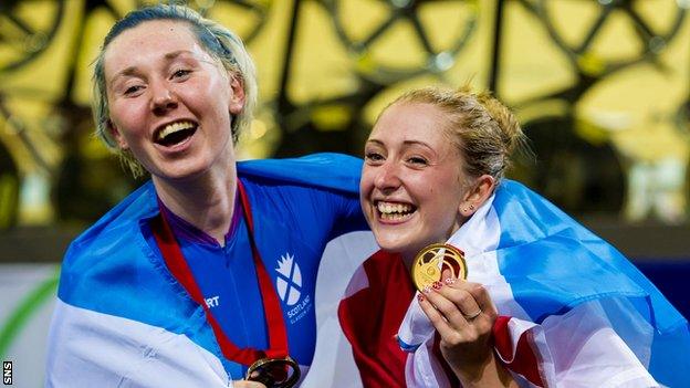 Katie Archibald (left) celebrate winning points race bronze in the 2014 Commonwealth Games behind gold medal winner Laura Trott (now Kenny)