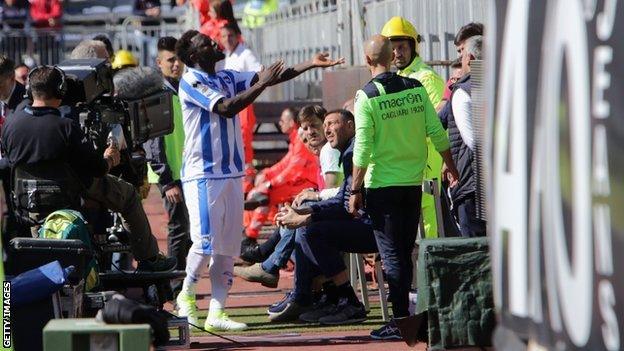 Sulley Muntari reacts with supporters during Pescara's 1-0 defeat at Cagliari