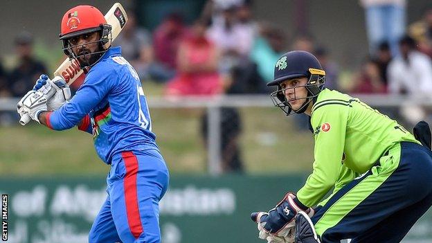 Afghanistan's Usman Ghani and Ireland's Lorcan Tucker