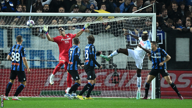 Napoli's Victor Osimhen scores against Atalanta