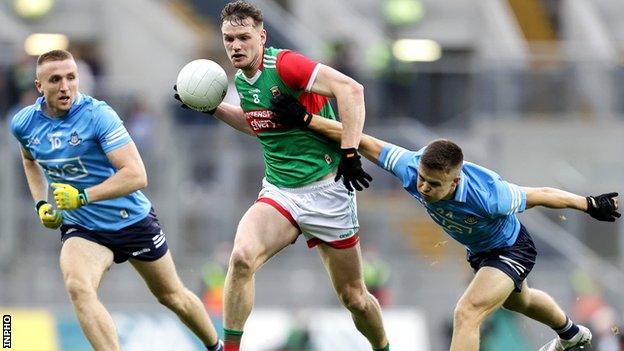 Mayo's Matthew Ruane attempts to burst away from Dublin's Eoin Murchan at Croke Park