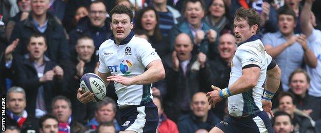 Duncan Taylor races down the right wing to score for Scotland