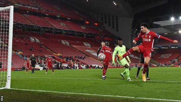 Curtis Jones scores for Liverpool against Ajax in the Champions League at Anfield