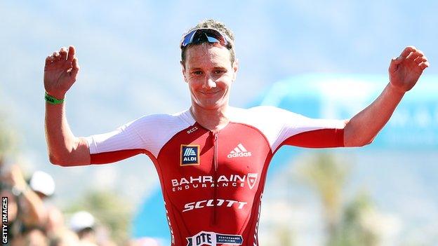 Alistair Brownlee celebrates finishing second at the Ironman in Marbella in April