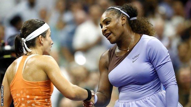 Serena Williams and Anastasija Sevastova shake hands at the end of their semi-final