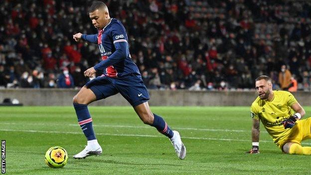 Kylian Mbappe scores