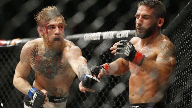 Conor McGregor (left) in action against Chad Mendes