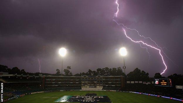 Lightning breaks over the ground as play is abandoned for the day due to rain and bad light during day three of the First Test between South Africa and Australia played at the Wanderers on February 28, 2009 in Johannesburg, South Africa.