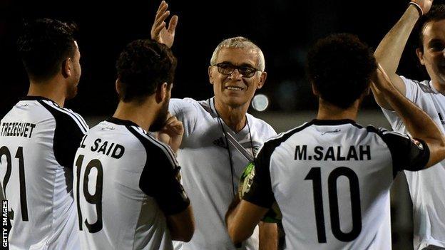 Egypt coach Hector Cuper speaks to his players during a training session