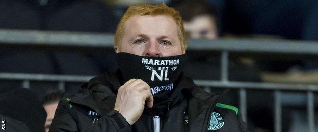 Hibs manager Neil Lennon is currently serving a three-match ban and watched the game from the stand