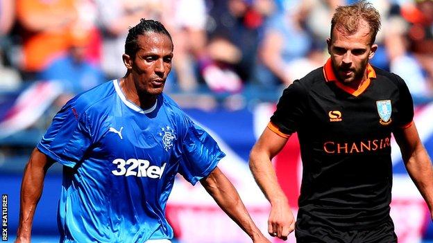 Rangers defender Bruno Alves and Sheffield Wednesday's Jordan Rhodes