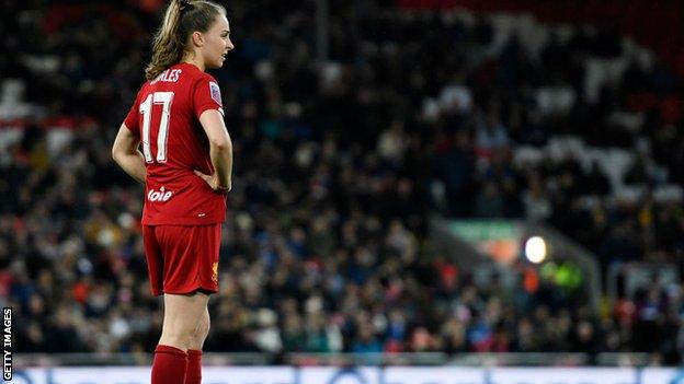 Niamh Charles playing against Everton at Anfield