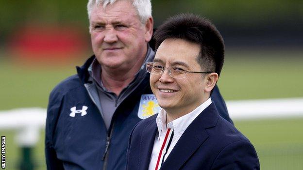 Dr Tony Xia and Aston Villa manager Steve Bruce