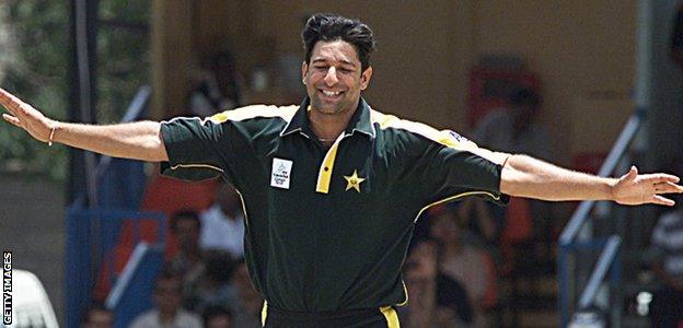 Wasim Akram celebrates taking a wicket