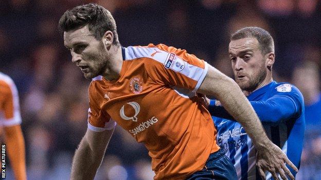 Stephen O'Donnell (left) in action for Luton Town against Hartlepool United