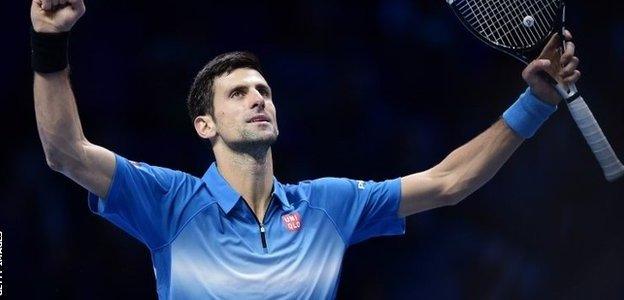 Serbia's Novak Djokovic celebrates after beating Spain's Rafael Nadal in the men's singles semi-final match