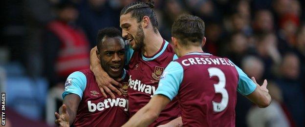 Michail Antonio (left) celebrates scoring for West Ham United.