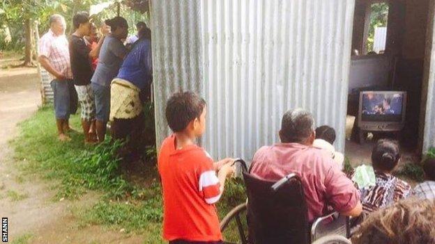 Tonga fans watch their team in action