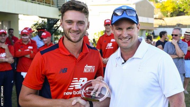 Worcestershire and North player Joe Clarke gets North-South 2018 player of the series award from Andrew Strauss