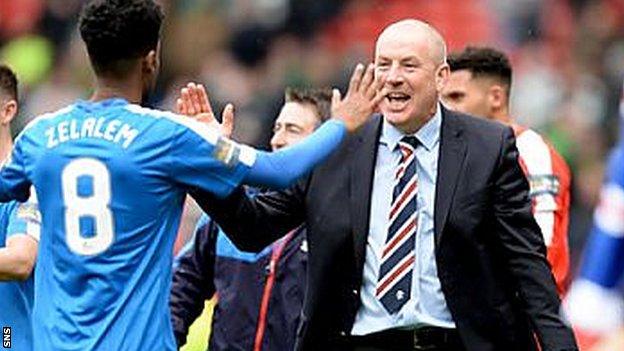 Mark Warburton celebrates Rangers' Scottish Cup semi-final win over Celtic with Gedion Zelalem