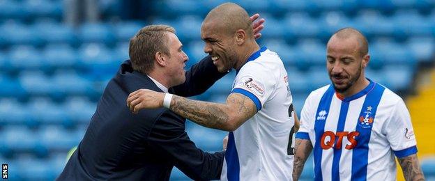 Kilmarnock manager Lee Clark celebrates with Josh Magennis