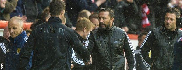 Celtic boss Ronny Deila (left) and Derek McInnes shake hands at the end of Saturday's match