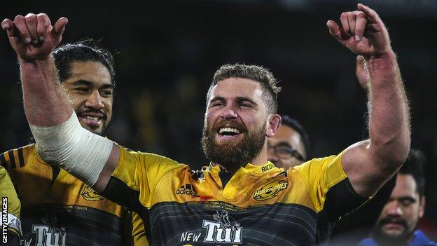 Callum Gibbins celebrates after the Hurricanes beat the Lions to win the 2016 Super Rugby final