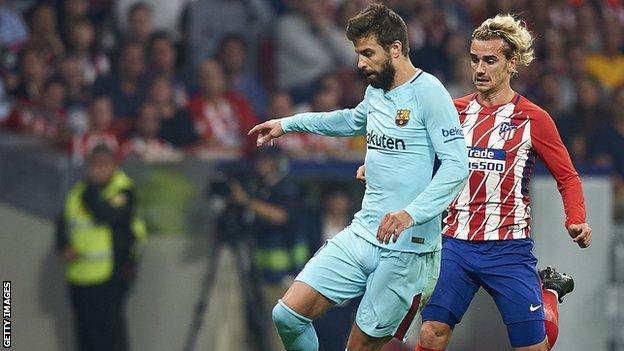 Gerard Pique and Antoine Griezmann