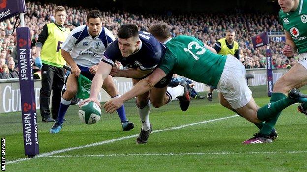 Blair Kinghorn scores a try for Scotland against Ireland