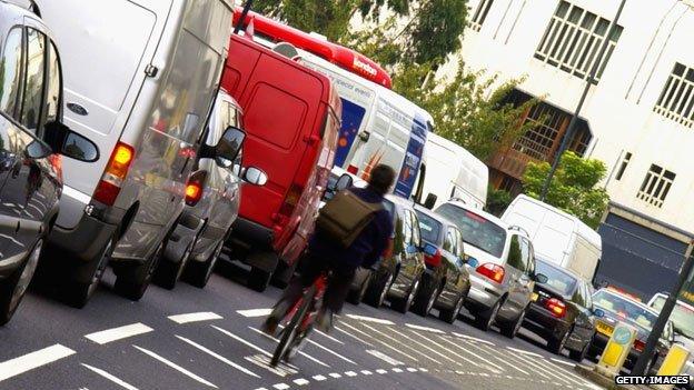 Cyclist in traffic