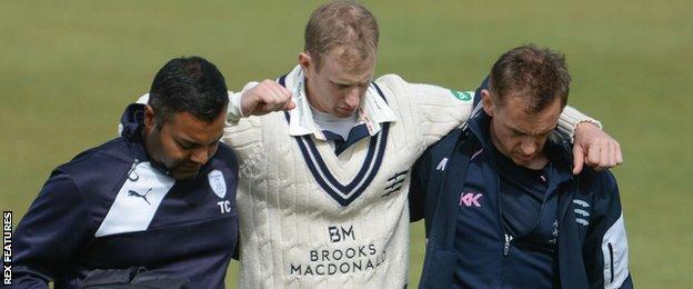 Adam Voges is helped from the field