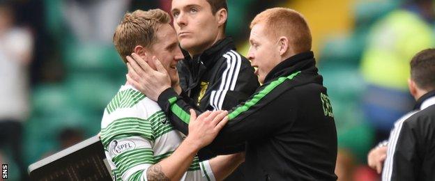 Neil Lennon, in his time as Celtic manager, congratulates Kris Commons on scoring against Aberdeen in May 2014