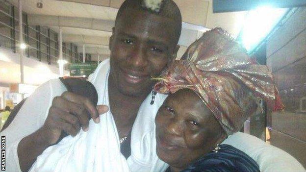 Francis Kone and his mother