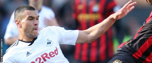 Steven Caulker in action for Swansea City