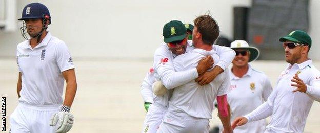 Alastair Cook walks off after being dismissed by Dale Steyn