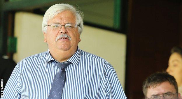 Port Vale owner Norman Smurthwaite attends a match