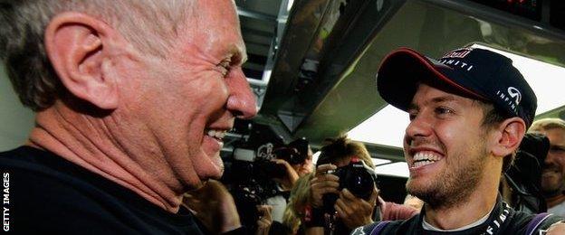 Sebastian Vettel celebrates the 2013 world title with Red Bull consultant Dr Helmut Marko