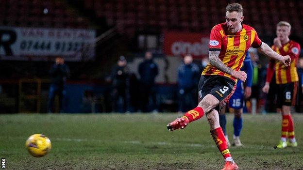 Kevin Holt scores a penalty for Partick Thistle against Queen of the South