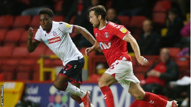 Jason Pearce (right) in action for Charlton