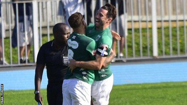 Ross Allen celebrates scoring a goal