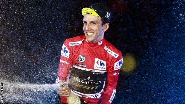 Simon Yates celebrates after his Vuelta a Espana win in Madrid