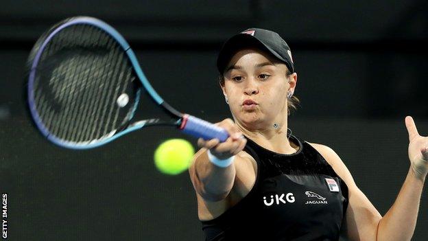 Ashleigh Barty returns against Coco Gauff in Adelaide