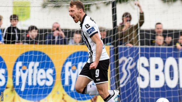 David McMillan celebrates after scoring his second-half penalty