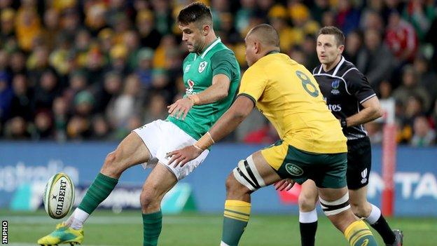 Australia's Caleb Timu attempts to charge down a Conor Murray kick in the Test series in June