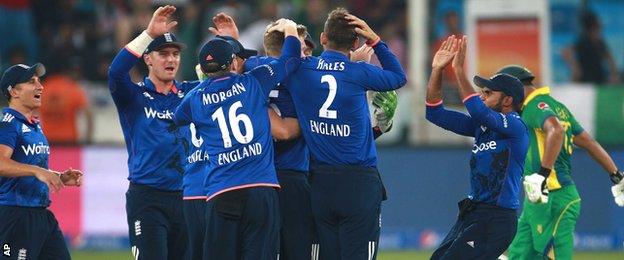 England celebrate a wicket